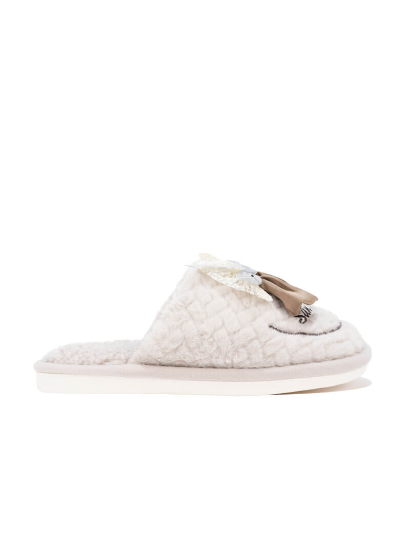 Pantoufles à nœud en peluche